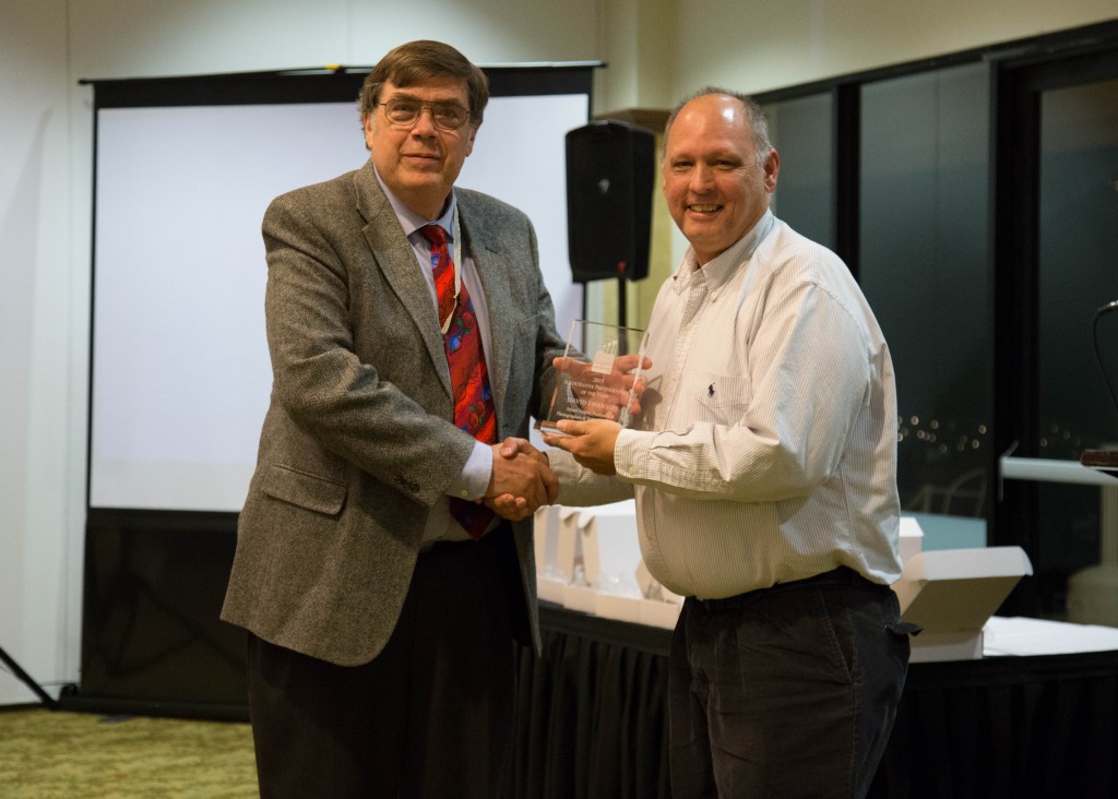 Dave Swanson receives his Illustrative Photographer of the Year from Bruce Bonnett